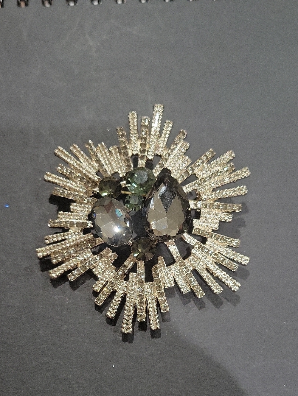 Vintage-Inspired Gold-tone Sunburst Brooch with Smoky Crystals